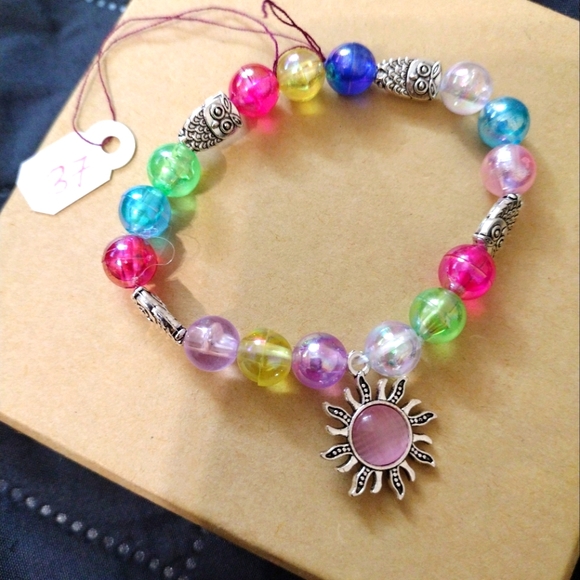 Artemis's Gems custom-made beaded bracelet with metal sun charm and owls rainbow - Picture 1 of 3